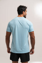Man wearing PeakForm Archive Pace Tee, rear view