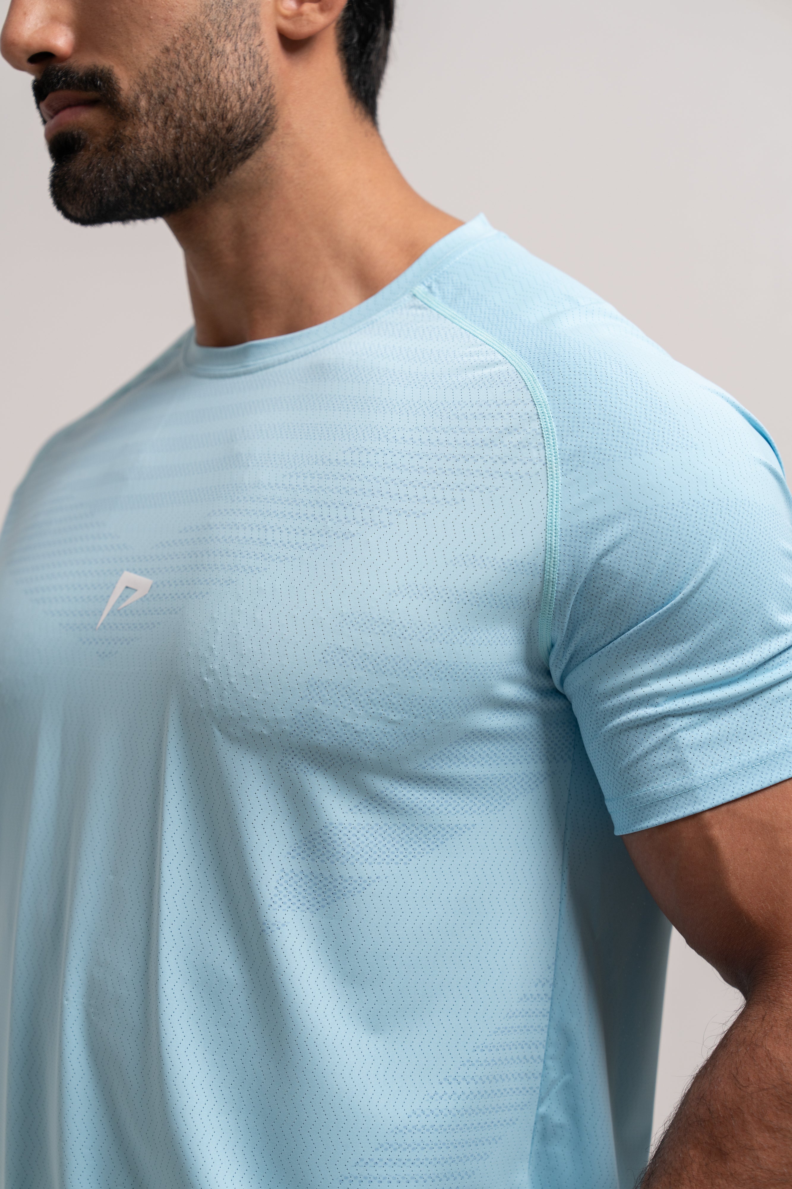 Man wearing PeakForm Archive Pace Tee, front view