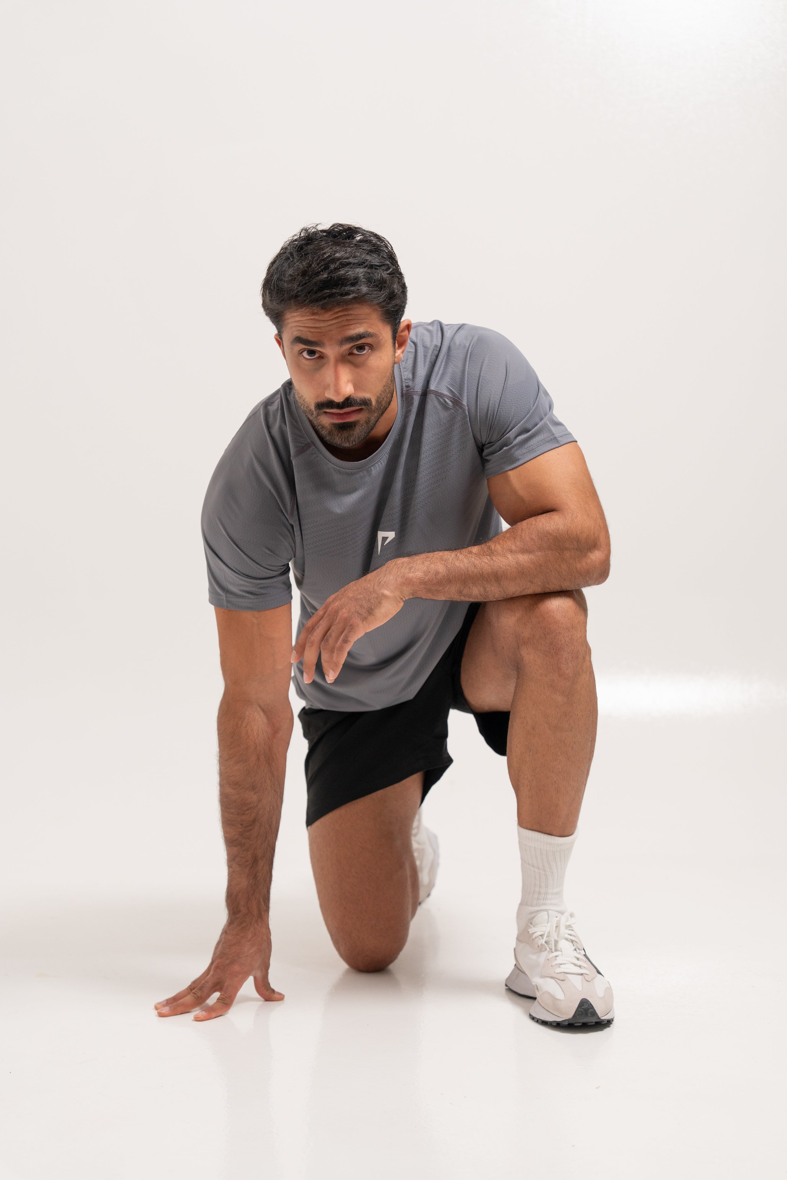 Man wearing PeakForm Prime Tee, front view