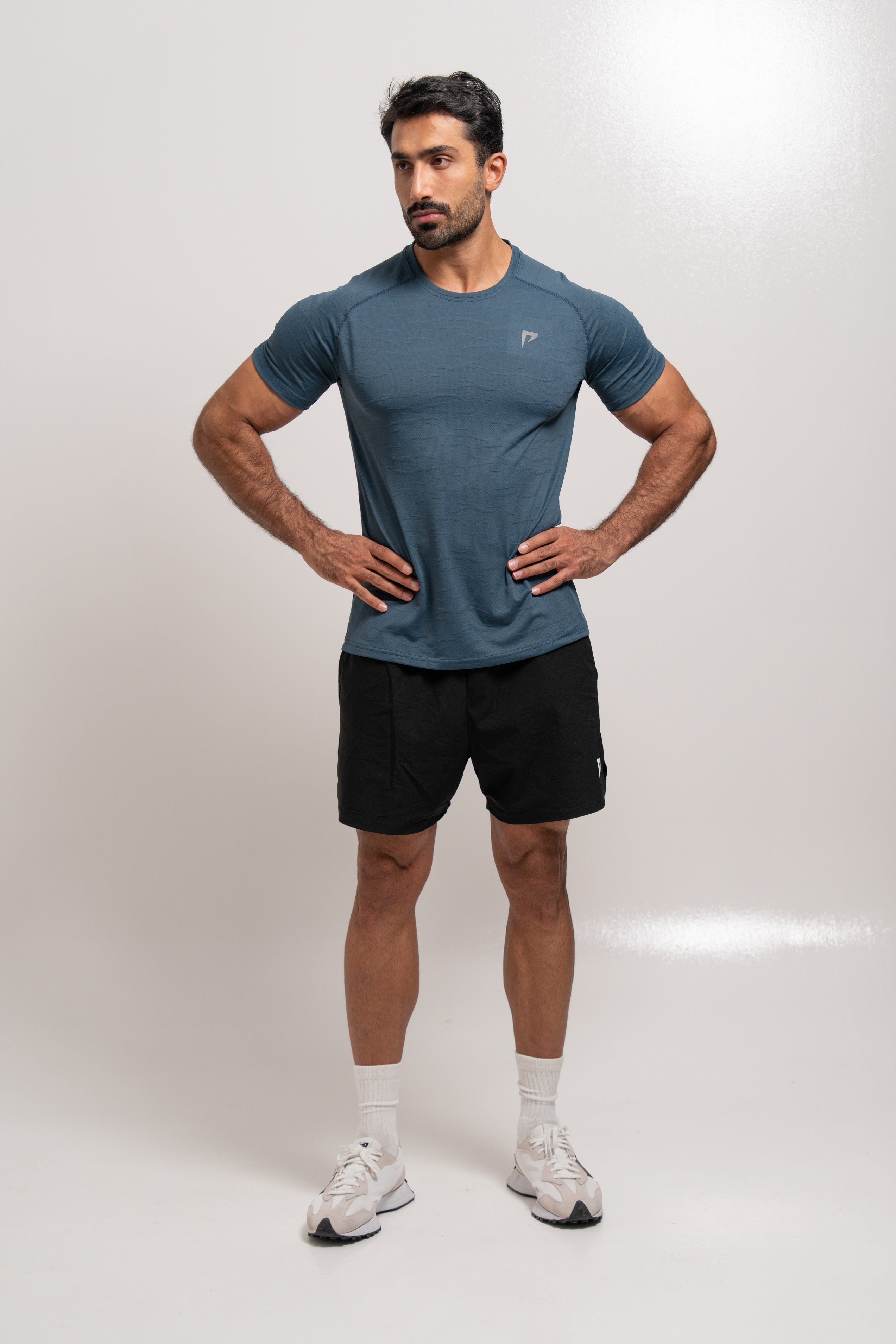 Man wearing PeakForm Prime Tee, front view
